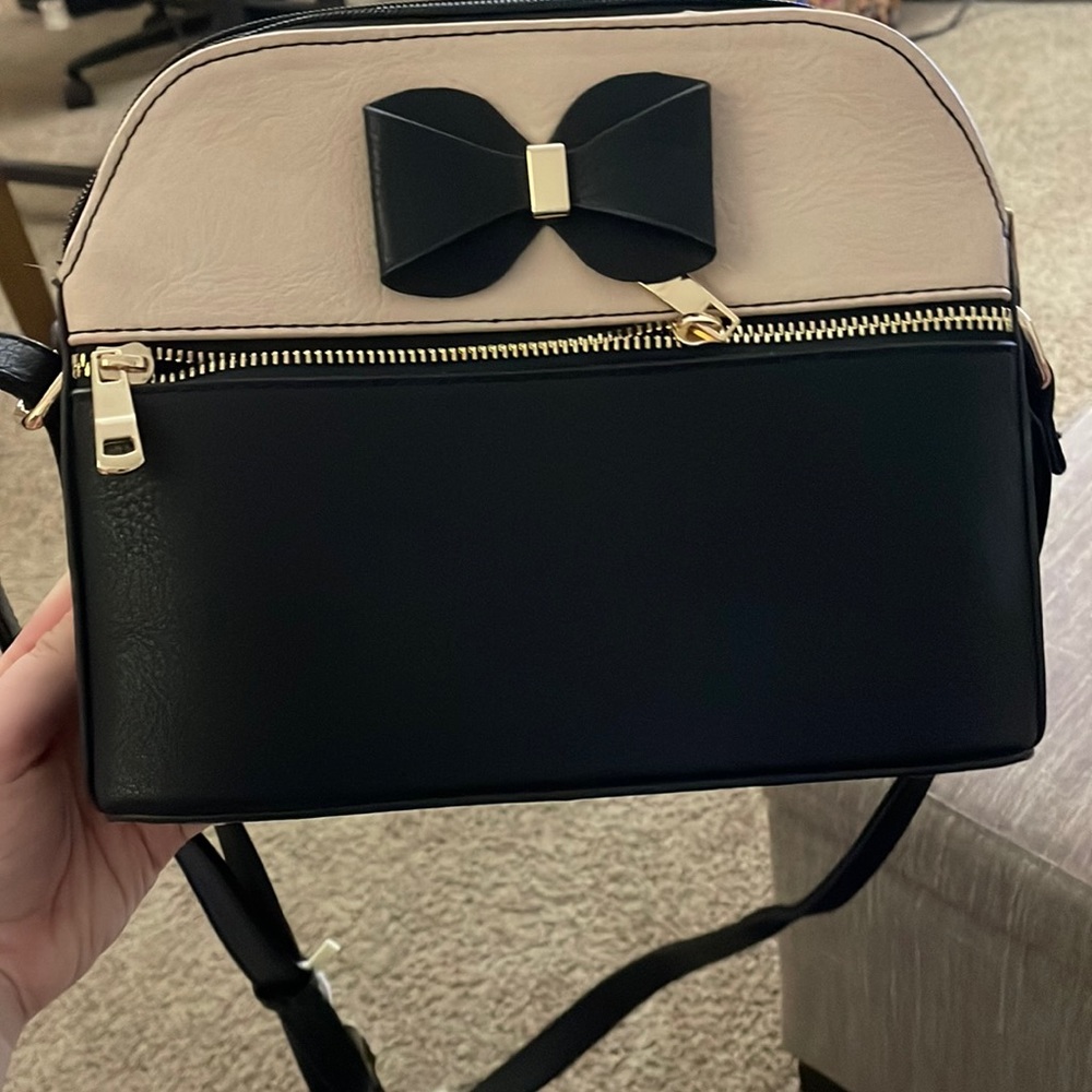 Black/pink mini bag with adjustable straps